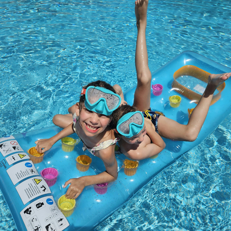 Two Kids Enjoying Summer Fun on Pool Float